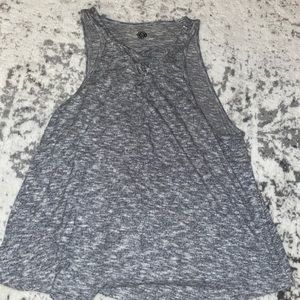 2 flowy ish tanks w criss cross